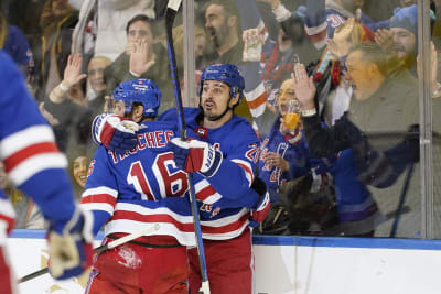 New Jersey Devils center Jack Hughes (86) celebrates scoring his first goal  in the third period in an NHL hockey game against the New York Rangers on  Tuesday, March 22, 2022, in
