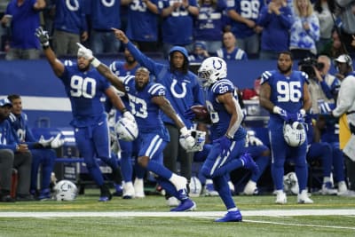 Taylor, ground game help Colts find easy path past Jets