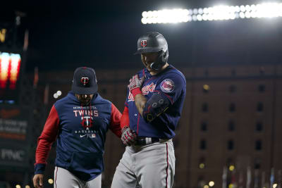 Minnesota Twins' Carlos Correa and Daniella Correa await the