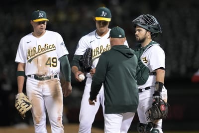 A's met by fans in Oakland with chants of `Sell the team!