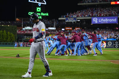 Reds, Cards scrap at plate and outfield, Castellanos tossed