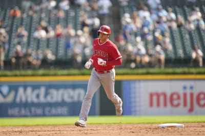 Mickey Moniak of the Los Angeles Angels celebrates as he rounds the bases  after hitting a