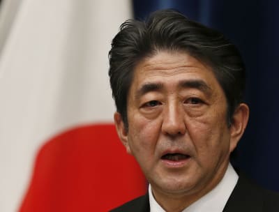 Japan PM purges Cabinet after support falls over church ties