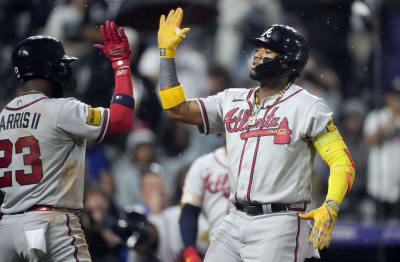 A security guard takes a ball from a little kid at the Braves-Pirates game  - NBC Sports