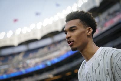 Wood fires ceremonial first pitch for Game 4