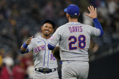 San Diego Padres' Luke Voit, left, celebrates after hitting a