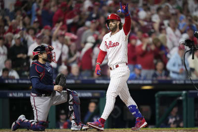 Bryce Harper homers in the 7th inning and leads the playoff-bound