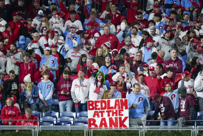 Phillies star Bryce Harper makes catch tumbling into photo pit in