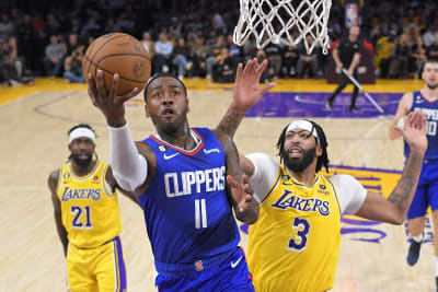 Kawhi scores 14 in return, Clippers hold off Lakers 103-97