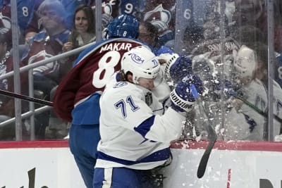 People consider merchandise while shopping at the team store Ball Arena,  Monday, June 27, 2022, in Denver after the Colorado Avalanche defeated the Tampa  Bay Lightning in Game 6 of the Stanley