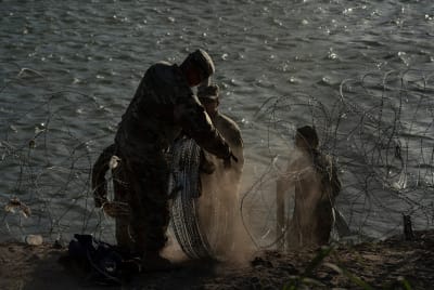 Border Patrol agents can resume cutting wire barrier placed at