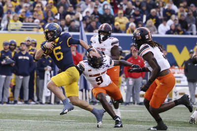 Gordon guides Oklahoma State to fifth straight win in Morgantown