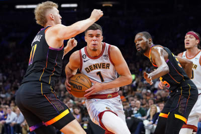 Devin Booker scores 23 in return, Suns roll past Heat to clinch playoff  spot