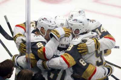 Reilly Smith places his baby inside Stanley Cup after Knights' victory