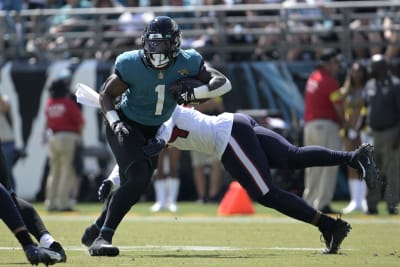 Jacksonville Jaguars running back Travis Etienne Jr. looks on