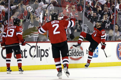 Jack Hughes of the New Jersey Devils reacts after scoring a goal