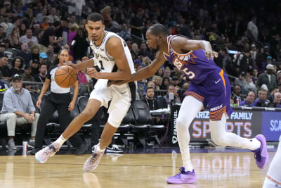 Devin Booker scores 23 in return, Suns roll past Heat to clinch playoff  spot