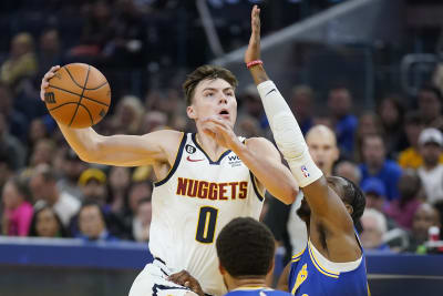 Jokic's Triple-double Leads Nuggets Past Warriors 131-124 - Bloomberg