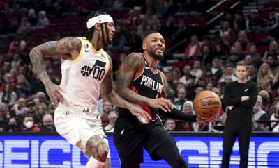 Rockets edge Trail Blazers for 50th win