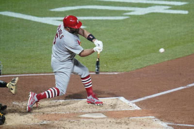 Albert Pujols, Rodolfo Castro chat at second base during game