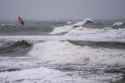 Gale-force winds and floods strike Northern Europe. At least 1