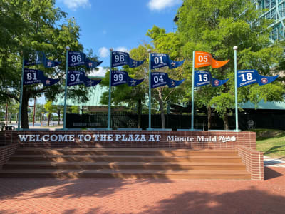 Astros 2022 World Series Champions pennant hung outside Minute