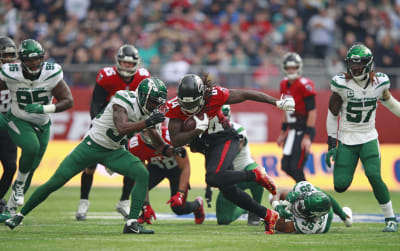 Atlanta Falcons safety Jaylinn Hawkins (32) defends against the