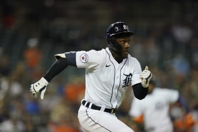 Detroit Tigers' Akil Baddoo, left, Victor Reyes (22) and Riley