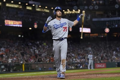 Cody Bellinger of the Chicago Cubs reacts after striking out