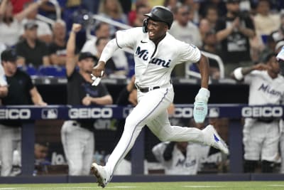 Miami Marlins Luis Arraez (3) with first base coach Jon Jay (11) during a  spring training baseball game against the Boston Red Sox on March 5, 2023  at JetBlue Park in Fort