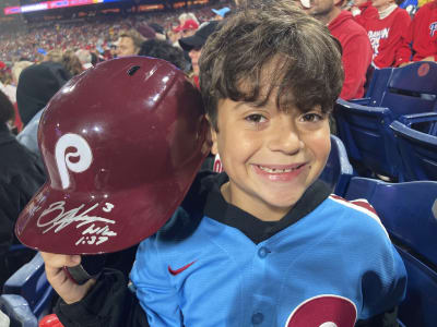 Phillies star Bryce Harper makes catch tumbling into photo pit in