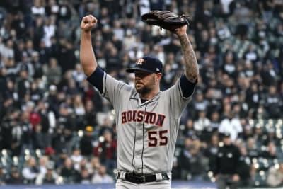 Houston Astros pitcher Ryan Pressly (55) celebrates with catcher