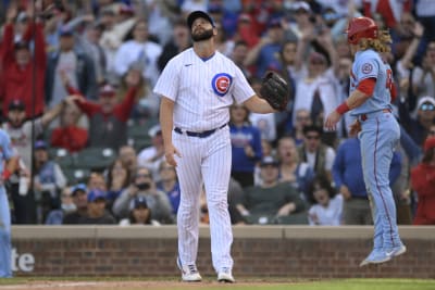Cubs score 4 times in 11th for 7-3 win over Reds