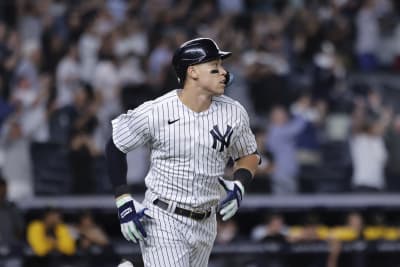 A cutout of New York Yankees right fielder Aaron Judge stands in a