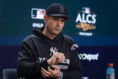 Yankees owner Hal Steinbrenner says Aaron Boone will return as