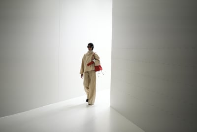 Dua Lipa walks the Versace runway, Prada resists normality