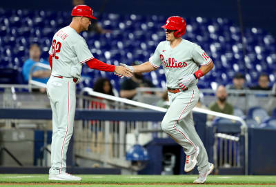 J.T. Realmuto crushes a two-run homer to seal the Phillies' 6-1 victory  over the Diamondbacks in Game 5 of the NLCS