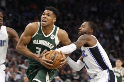 Bucks begin title defense with 127-104 victory over Nets