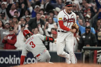 Spike This! Hoskins, Harper homer, Phils rout Braves in NLDS