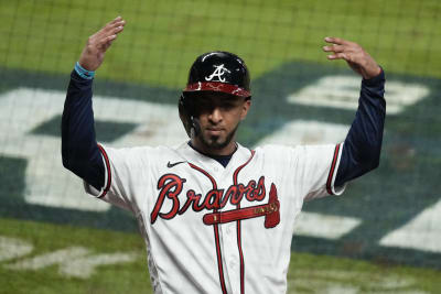 Travis D'Arnaud of the Atlanta Braves shakes hands with Will Smith