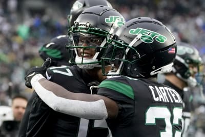 EAST RUTHERFORD, NJ - AUGUST 28: New York Jets quarterback Mike White (5)  throws a pass during