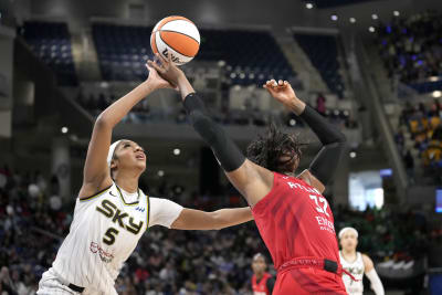 Angel Reese secures 14th straight double-double in the closing seconds as  the Sky beat the Dream