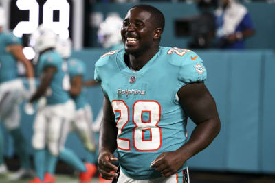 Dolphins cut RB Michel, 11 others as roster trim continues ahead