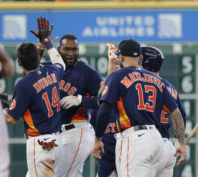 Mauricio Dubon of the Houston Astros hits a single during the fifth News  Photo - Getty Images