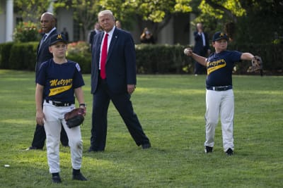 U.S. President Donald Trump with Mariano Rivera, the MLB Hall of Fame  Closer from the Yankees, watch young players to mark the Opening Day of the Major  League Baseball Season on the