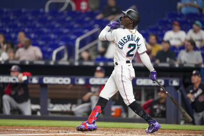 Miami Marlins' Jazz Chisholm Jr. (2) rounds the bases after