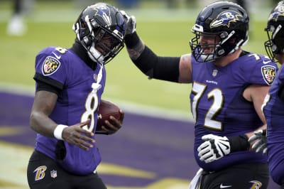 Jackson leads surging Ravens to 40-14 rout of Jaguars