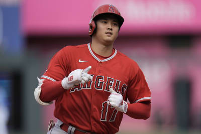 Shohei Ohtani of the Los Angeles Angels celebrates wearing a