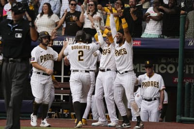 San Diego Padres' Matt Carpenter scores during the second inning