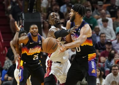 Booker has 23 points in return, Suns roll past Heat 111-90